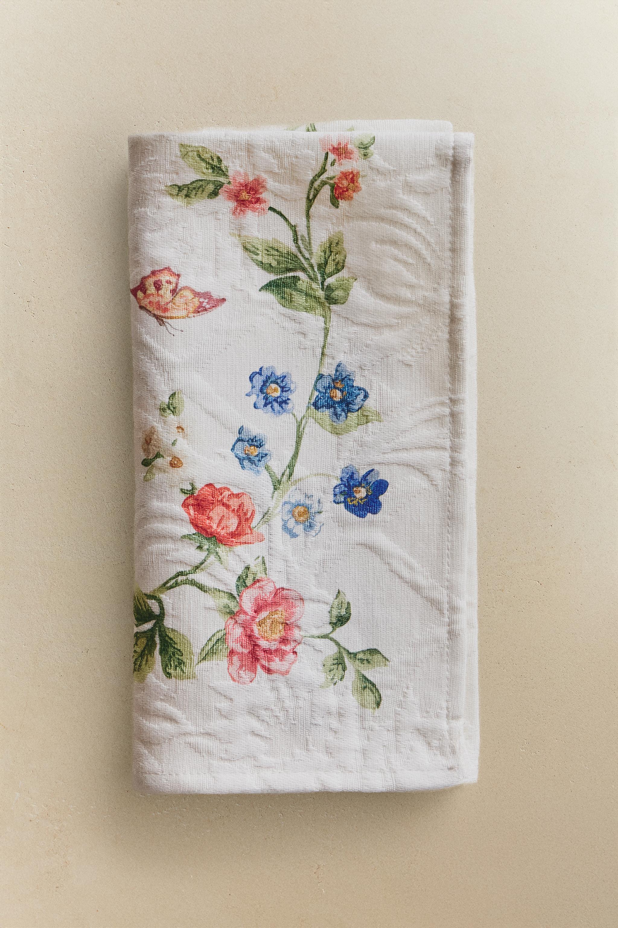 LOT DE 2 SERVIETTES DE TABLE JACQUARD ET IMPRIMÉ FLORAL